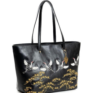 Vegan friendly Antheia Tote Bag with embroidered details on the front