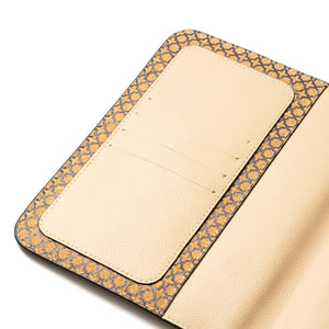 Beige fabric with a floral pattern border on a white background