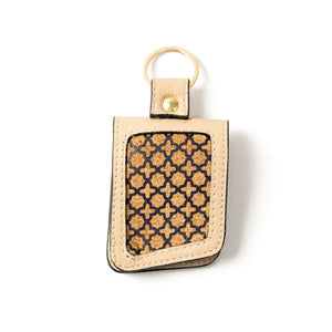 Keychain with geometric pattern on beige background