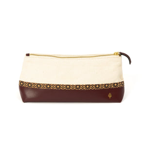Pouch with white front and brown bottom half on a white background