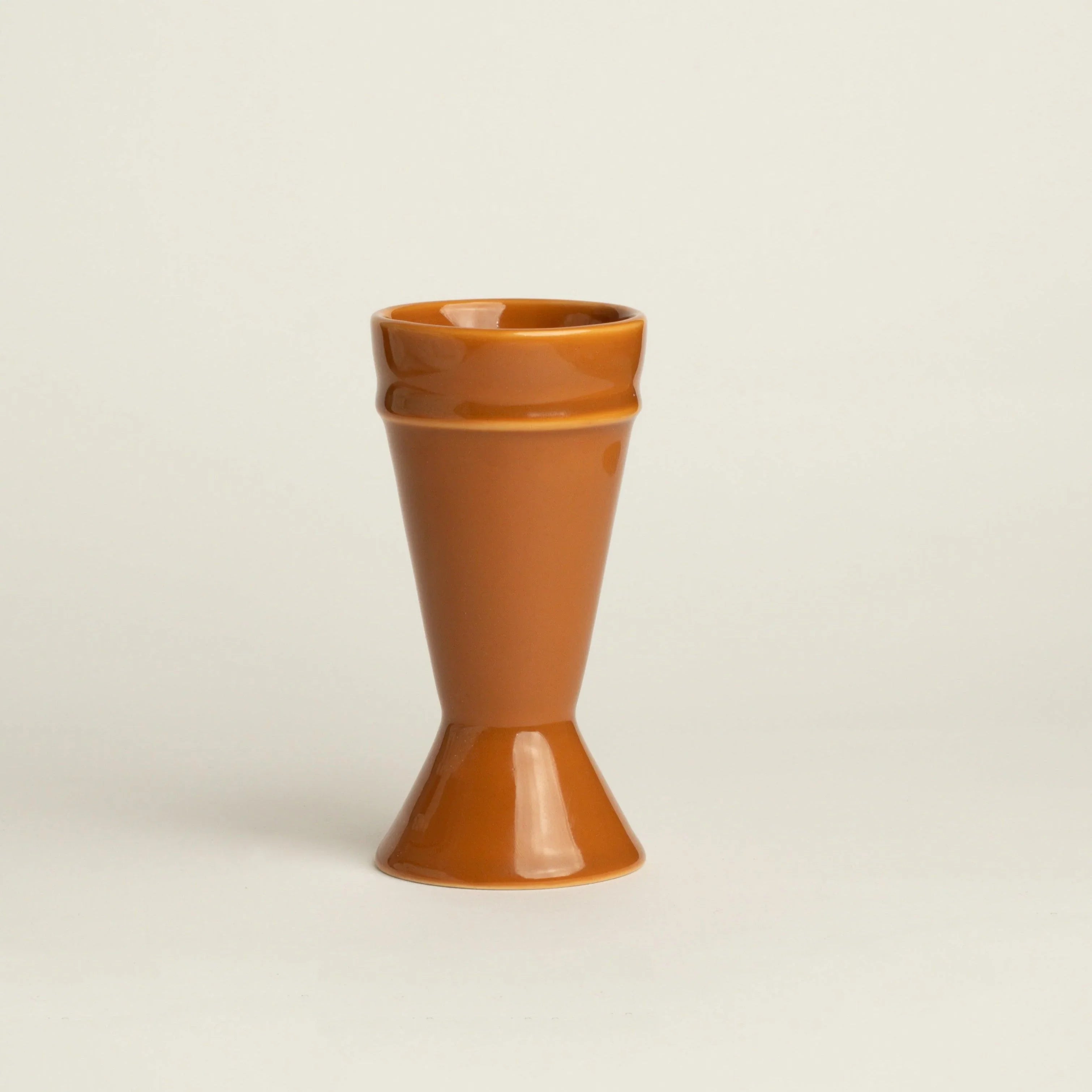 Ethically produced caramel mazagran coffee cup on a white background