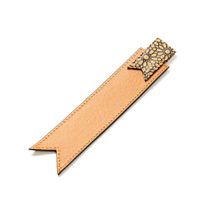 Vegan Leather bookmark with decorative end on a white background