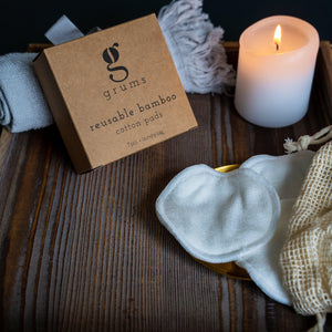 reusable cotton face wipes shown with laundry bag for easy washing