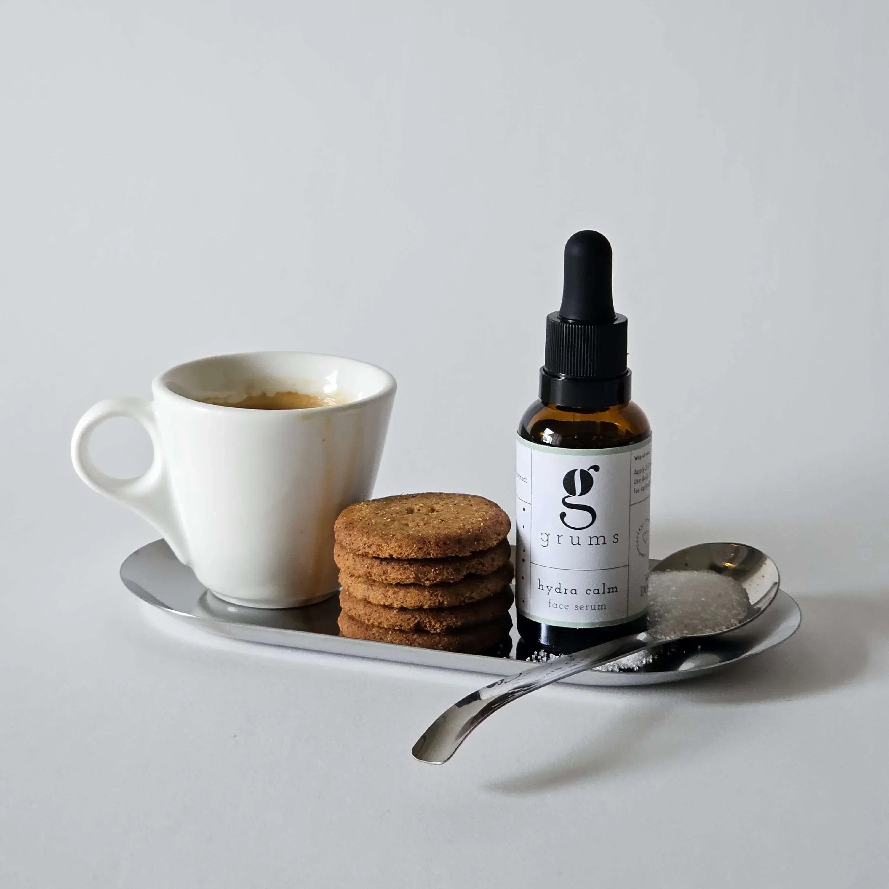 grums hydra calm serum shown with a coffee up on a tray